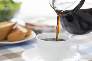 Coffee Pouring in Cup